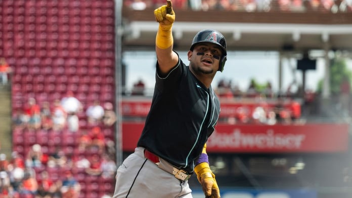 Gabriel Moreno gestures after hitting a home run in the eighth inning against the Cincinnati Reds