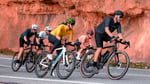 Garmin cyclists wearing smartwatches during a ride