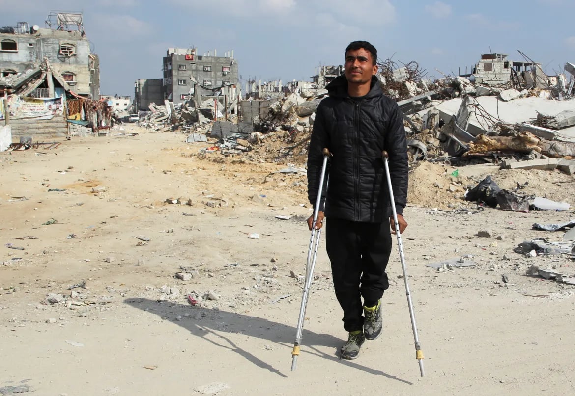 A Palestinian man walks through the rubble of destroyed buildings in Gaza after Israeli attacks, as the US approves a $6.7 billion weapons deal for Israel