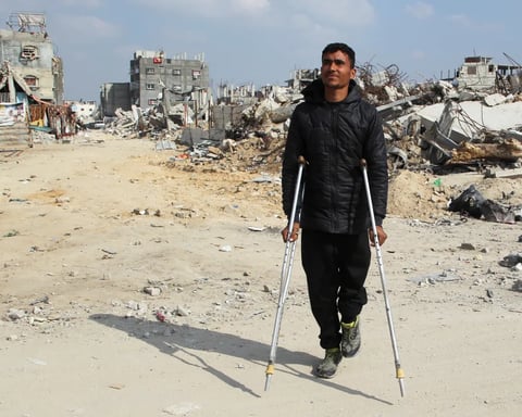 A Palestinian man walks through the rubble of destroyed buildings in Gaza after Israeli attacks, as the US approves a $6.7 billion weapons deal for Israel
