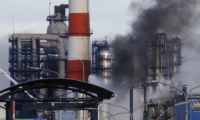 Smoke billows from a Gazprom Neft oil refinery in Russia