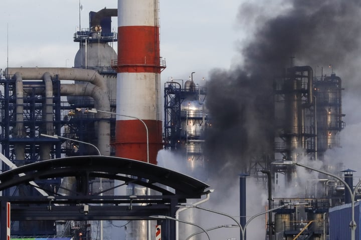 Smoke billows from a Gazprom Neft oil refinery in Russia