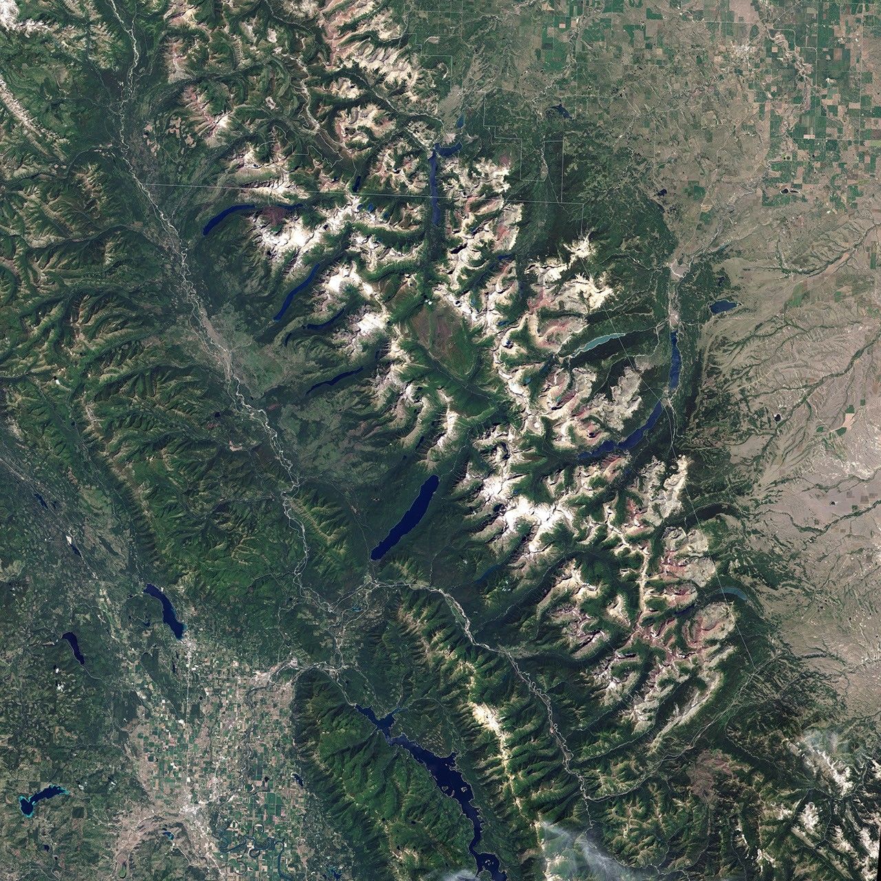 NASA Landsat 7 view of Glacier-Waterton International Peace Park in Montana, the subject of climate exhibits ordered restored by Judge Angel Kelley