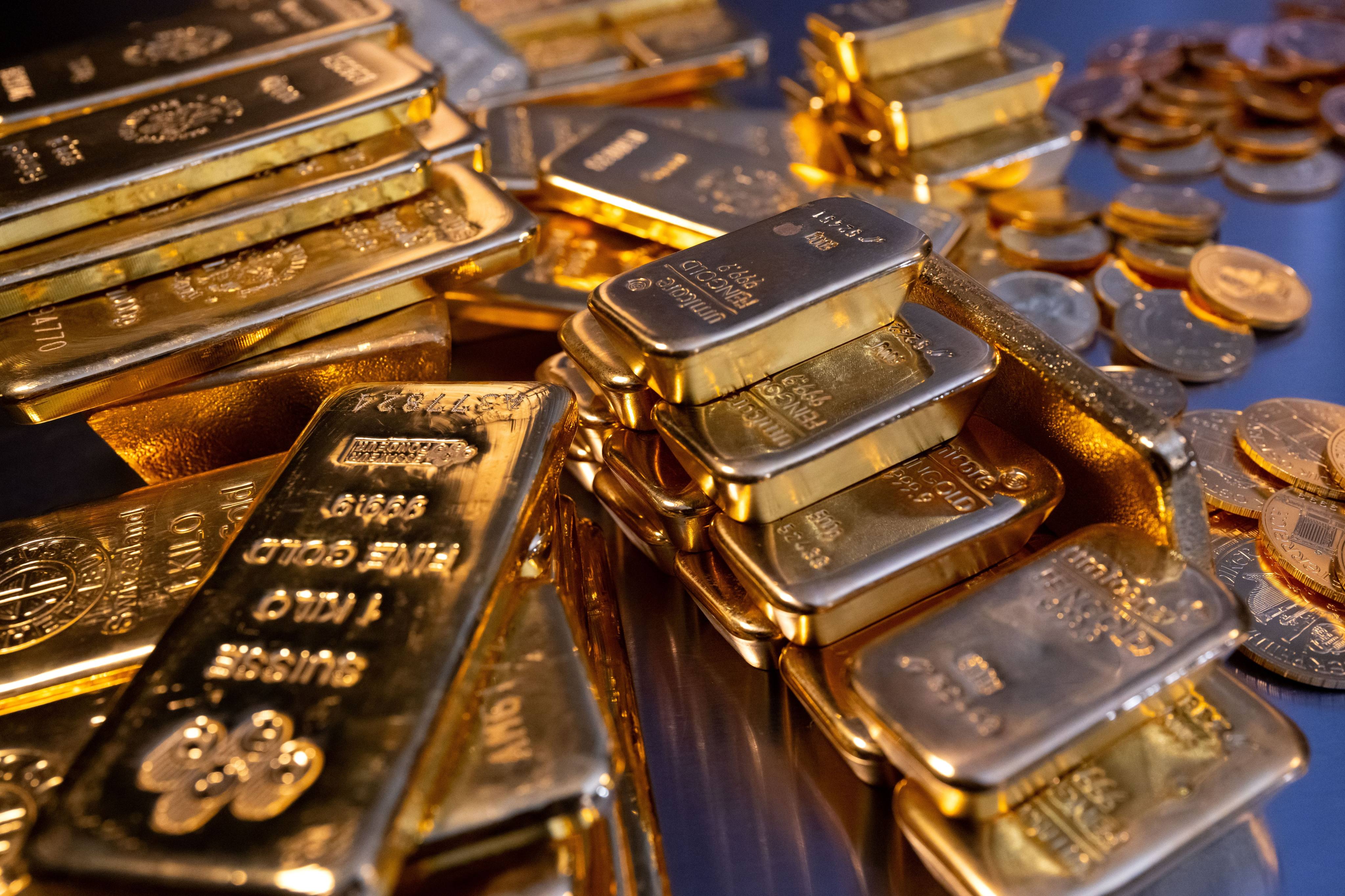 Stacked gold bullion bars in a central bank vault as ECB confirms gold has overtaken US Treasuries in global reserves