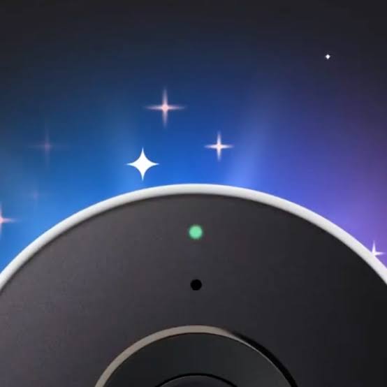 Close-up of Google Gemini Home Speaker showing glowing light ring interface