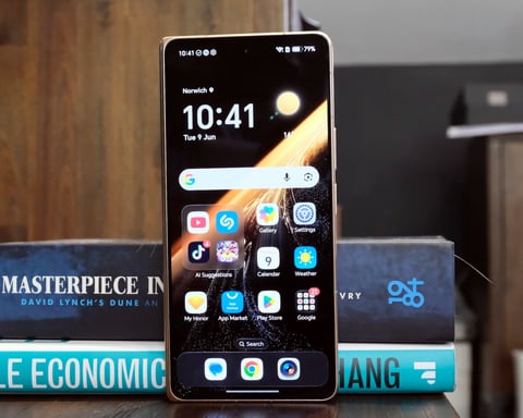 Honor Magic V6 foldable smartphone open showing inner 7.95-inch AMOLED display