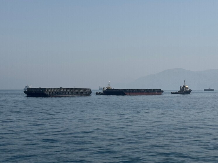 Oil tankers lined up in the Persian Gulf unable to transit the Strait of Hormuz
