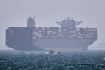 A container ship anchored in the Strait of Hormuz off Bandar Abbas, Iran