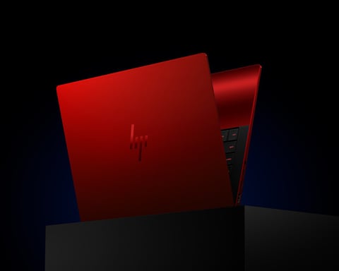 HP Limited Edition Scuderia Ferrari AI PC in Rosso Magma red with transparent engine bay base panel