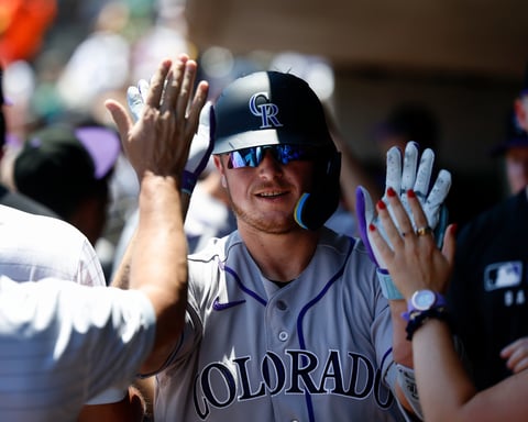 Hunter Goodman is greeted by teammates after his two-run home run against the Athletics at Las Vegas Ballpark June 14 2026