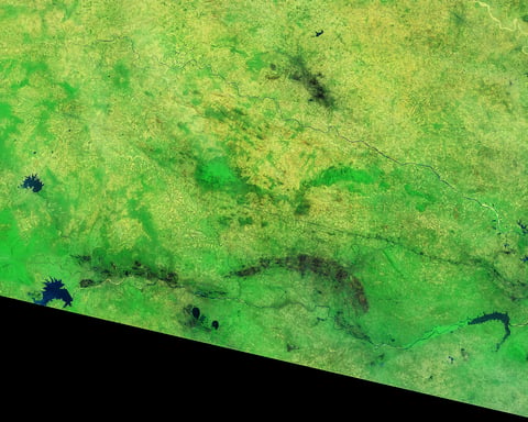 NASA Landsat satellite image of a severely depleted reservoir in India before the monsoon