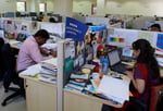 Employees work at the Tata Consultancy Services headquarters in Mumbai, India