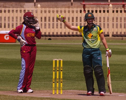 Women cricketers in action during an international match, illustrating India's Women's T20 World Cup win over Pakistan