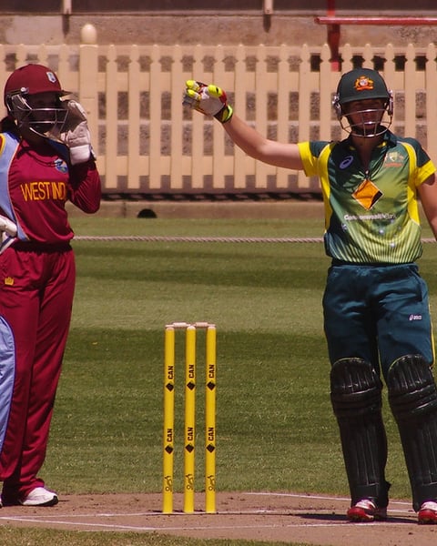 Women cricketers in action during an international match, illustrating India's Women's T20 World Cup win over Pakistan