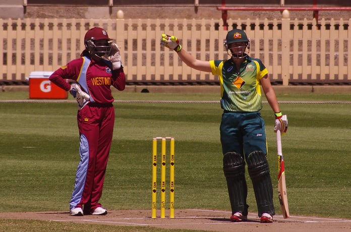 Women cricketers in action during an international match, illustrating India's Women's T20 World Cup win over Pakistan