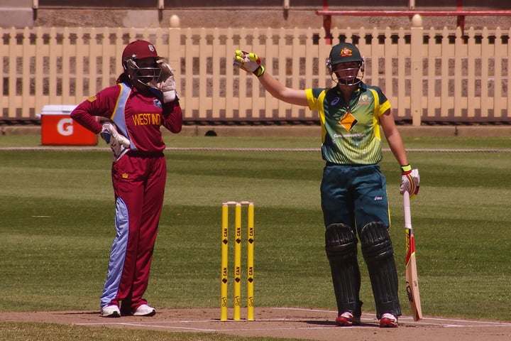 Women cricketers in action during an international match, illustrating India's Women's T20 World Cup win over Pakistan
