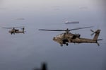 Iranian Foreign Minister Abbas Araghchi warns foreign forces near Strait of Hormuz after Apache helicopter incident