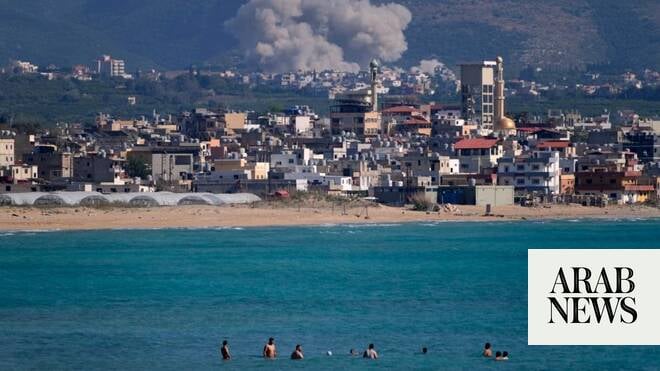 Smoke rises from an Israeli airstrike on Qlaileh village as seen from the southern port city of Tyre, Lebanon