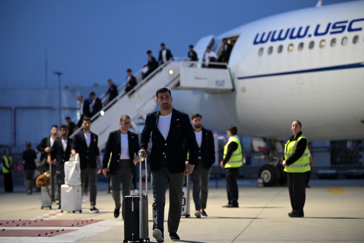 Iran national football team arrives for the 2026 World Cup wearing pins for children killed in the Minab school strike