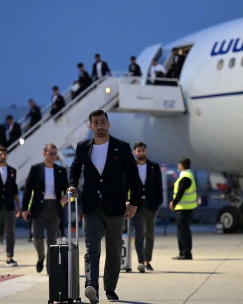 Iran national football team arrives for the 2026 World Cup wearing pins for children killed in the Minab school strike