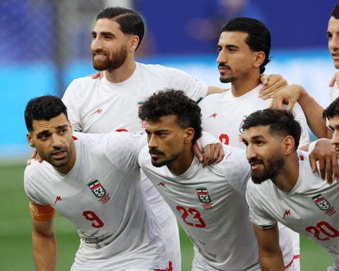 Iran players react after the 2-2 FIFA World Cup 2026 draw against New Zealand amid controversy over travel restrictions in the United States.