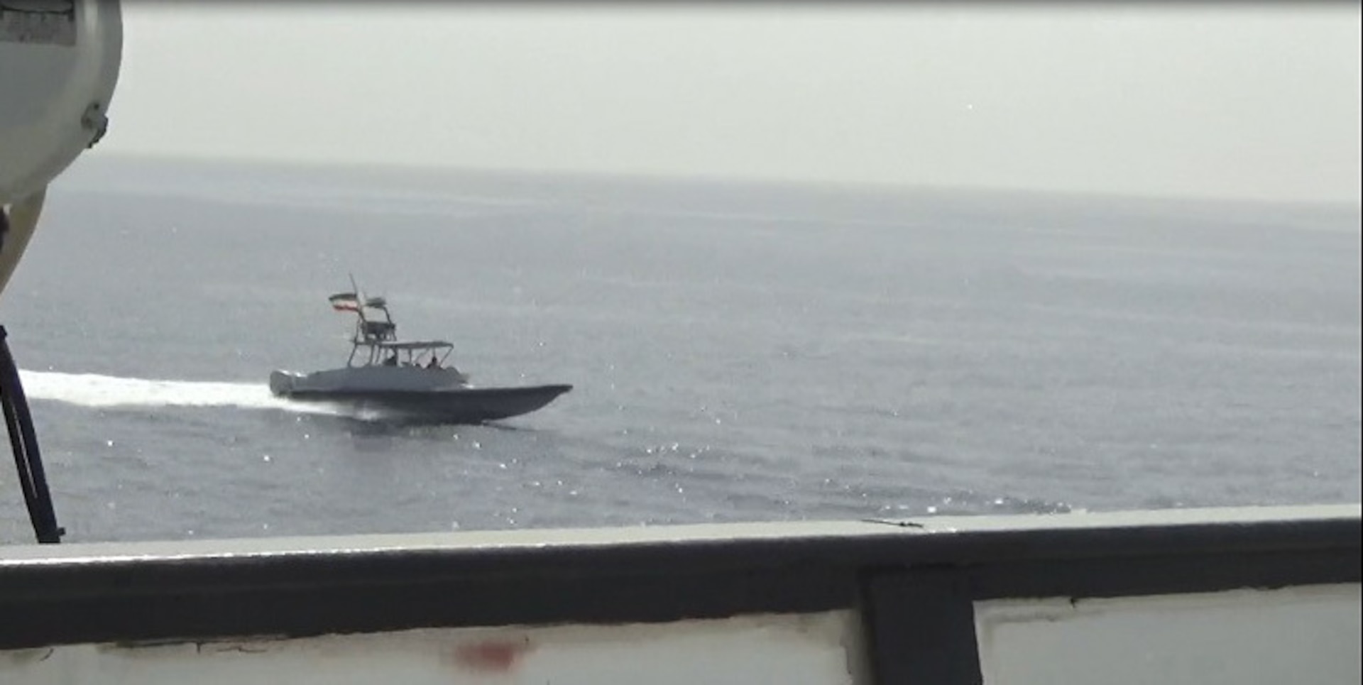 Iranian IRGC speedboat approaches US Navy vessels in the Persian Gulf