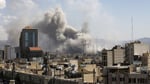 Smoke plume rising over buildings in Tehran following Israeli airstrikes on June 8 2026