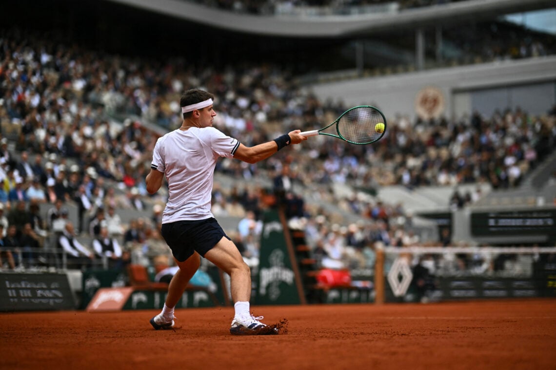 Jakub Mensik hits a forehand during his first Grand Slam semifinal at Roland Garros 2026