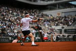 Jakub Mensik hits a forehand during his first Grand Slam semifinal at Roland Garros 2026