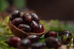Fresh jamun black plum fruit known for antidiabetic properties in Ayurvedic medicine