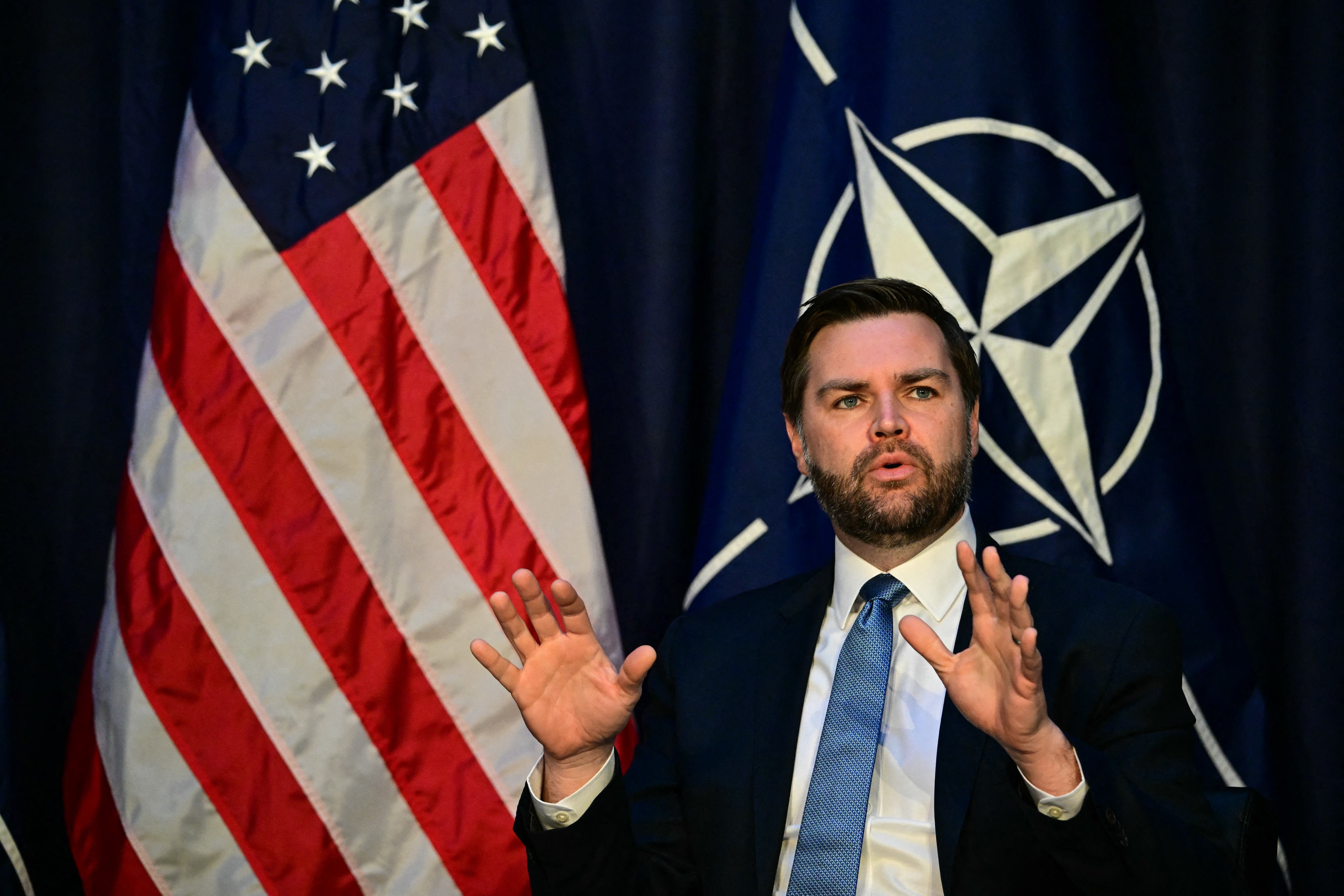 US Vice President JD Vance speaking at the 2025 Munich Security Conference where he attacked European migration policy