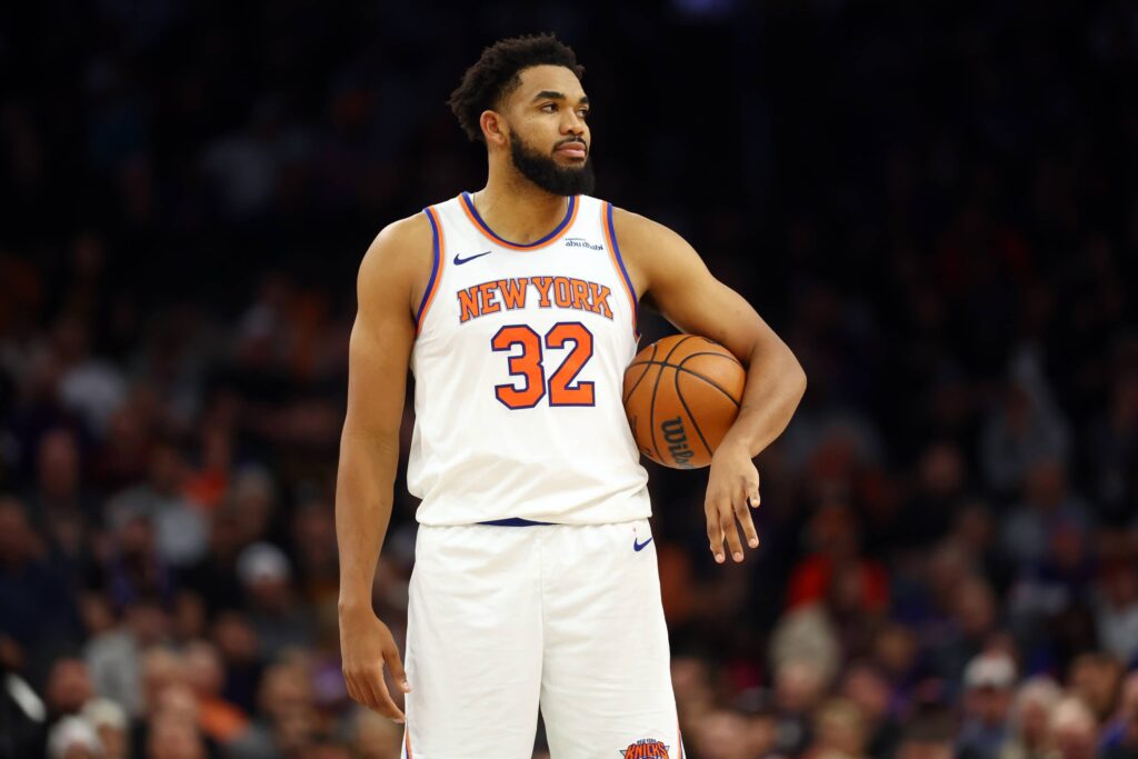 Karl-Anthony Towns of the New York Knicks drives against the Phoenix Suns