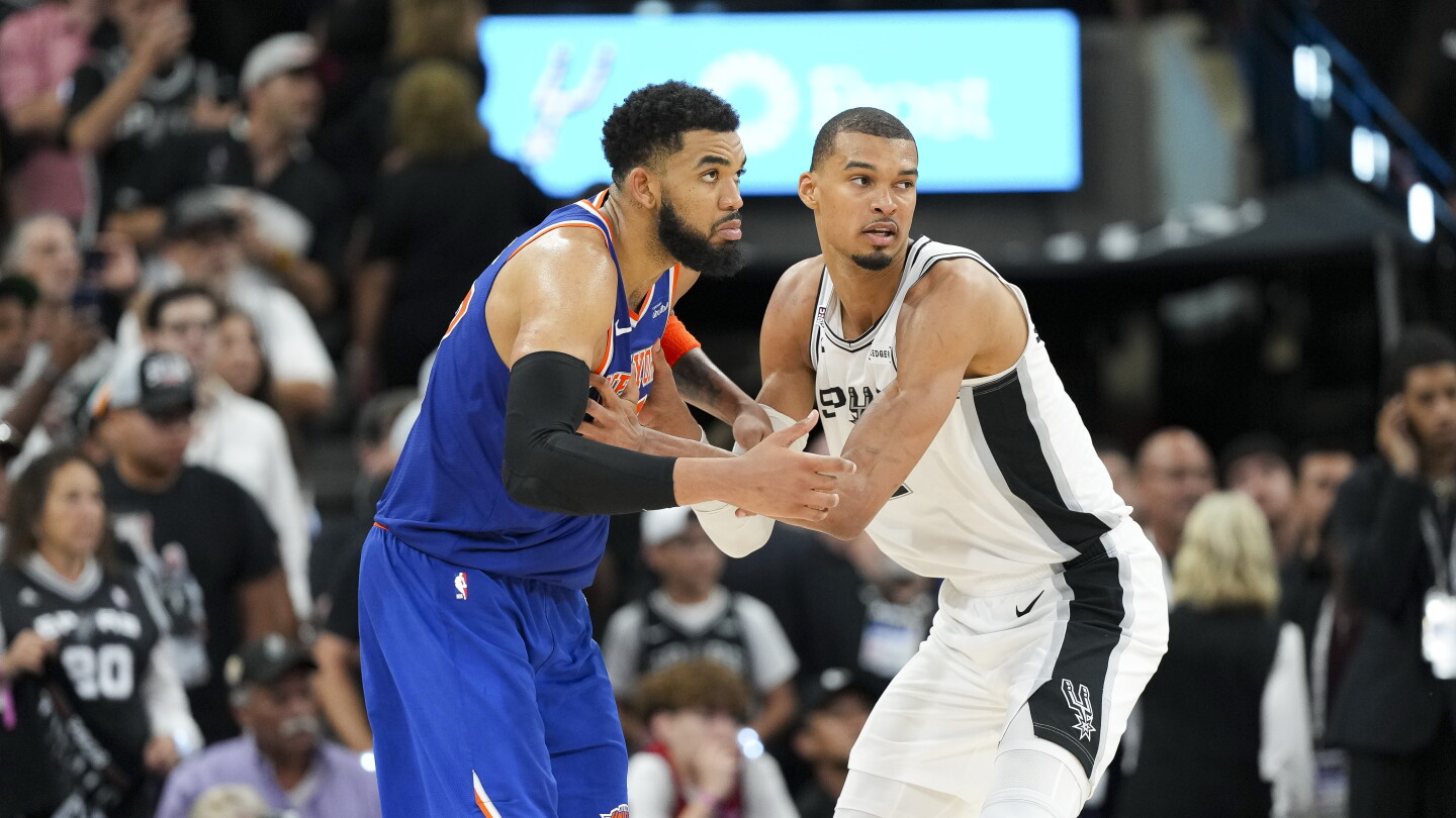 Karl-Anthony Towns battles Victor Wembanyama in Game 2 of the 2026 NBA Finals at Frost Bank Center