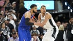 Karl-Anthony Towns battles Victor Wembanyama in Game 2 of the 2026 NBA Finals at Frost Bank Center