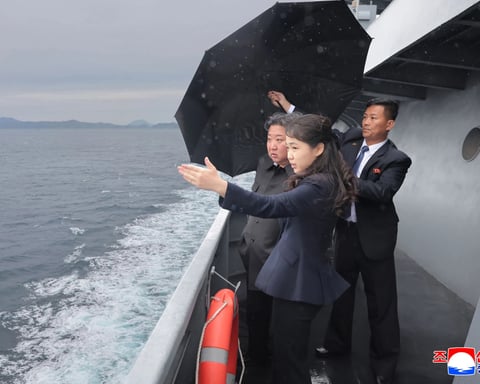 Kim Jong Un and his daughter observe the sea trials of destroyer Kang Kon at an undisclosed location in North Korea, June 4, 2026