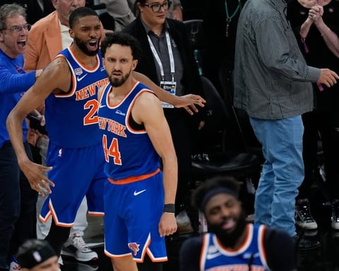 New York Knicks players celebrate after winning Game 2 of the 2026 NBA Finals against the San Antonio Spurs