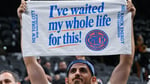 New York Knicks players celebrate on the court after winning the 2026 NBA championship over the San Antonio Spurs