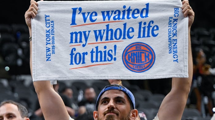 New York Knicks players celebrate on the court after winning the 2026 NBA championship over the San Antonio Spurs