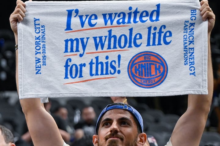 New York Knicks players celebrate on the court after winning the 2026 NBA championship over the San Antonio Spurs