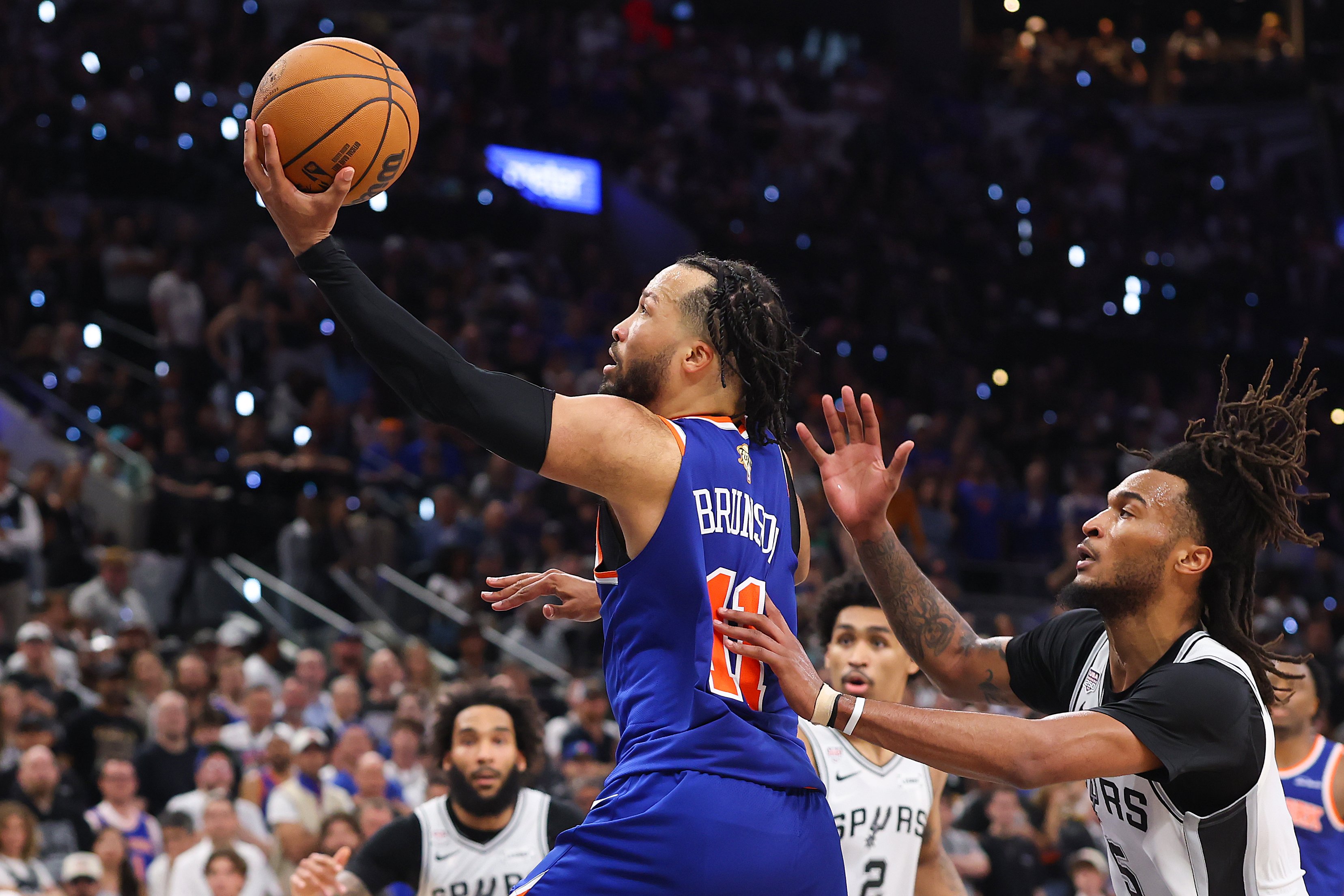 Jalen Brunson #11 of the New York Knicks shoots past Stephon Castle in Game 5 of the 2026 NBA Finals