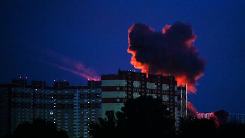 Smoke billowing over Kyiv skyline after Russian drone and missile strikes, June 2026