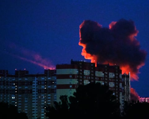 Smoke billowing over Kyiv skyline after Russian drone and missile strikes, June 2026