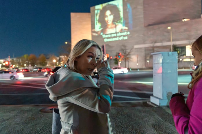 Danielle Bensky wipes a tear at a World Without Exploitation event calling on Congress to pass the Epstein files transparency act