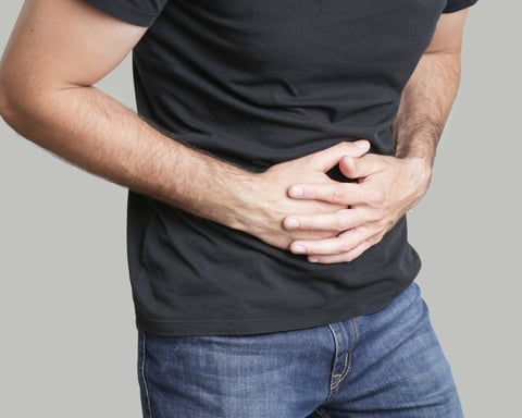 A man consulting a doctor about chronic pelvic pain and CP/CPPS diagnosis