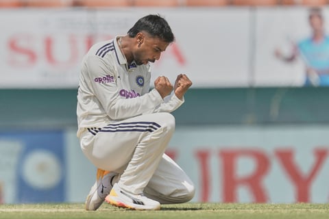 Manav Suthar celebrates his maiden Test wicket against Afghanistan in New Chandigarh