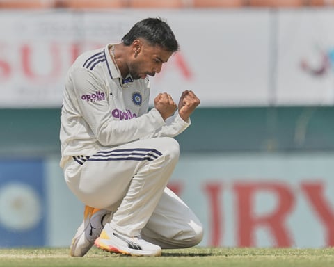 Manav Suthar celebrates his maiden Test wicket against Afghanistan in New Chandigarh