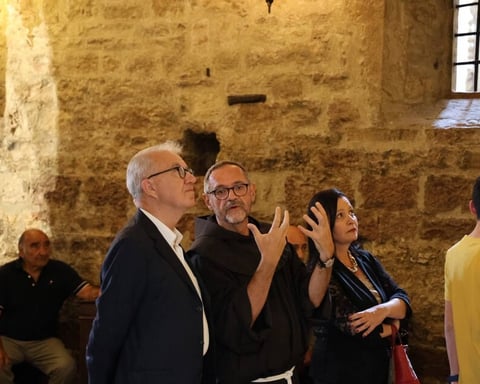 Alfredo Mantovano Italian Undersecretary speaking at Assisi conference on international tensions June 2026