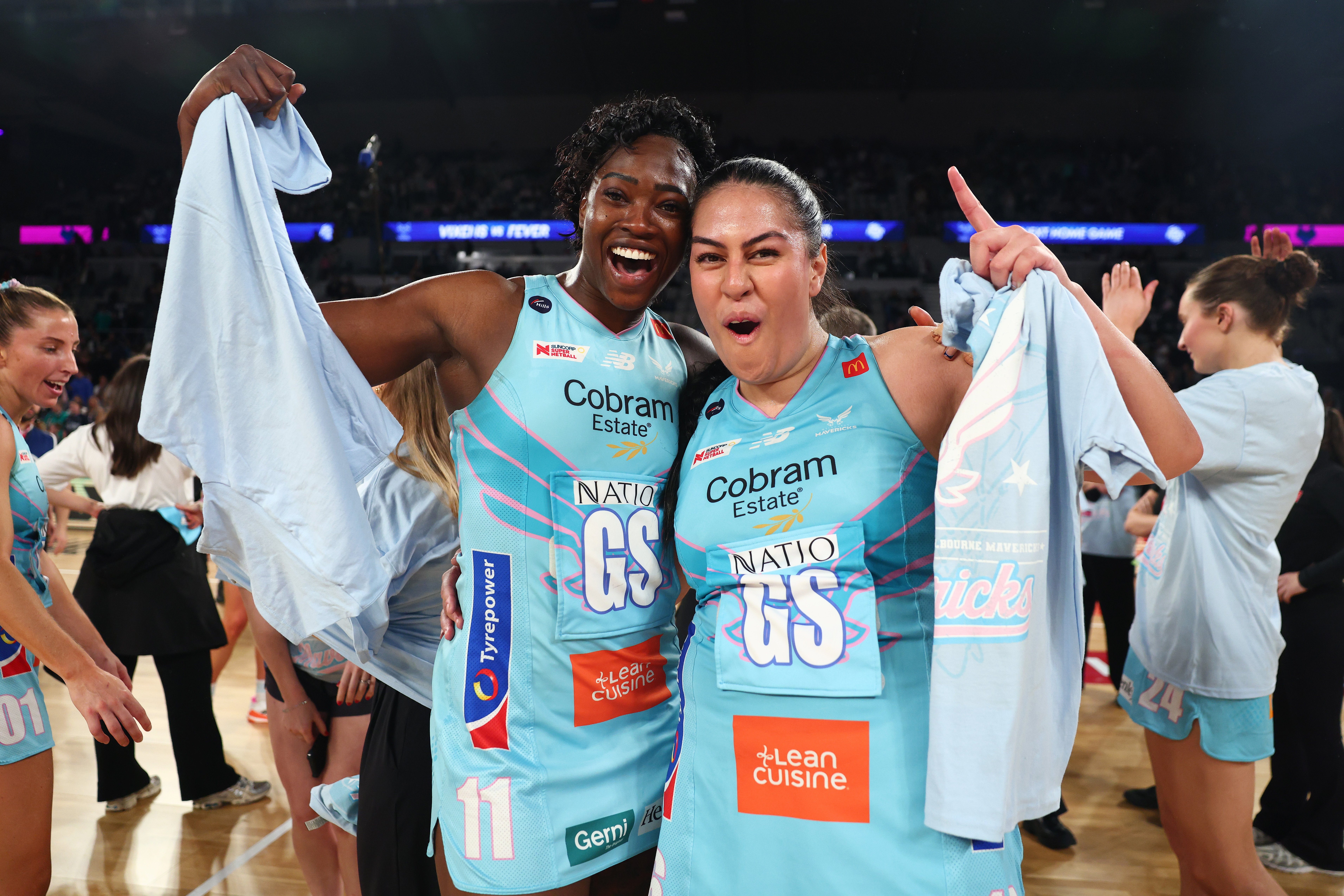 Melbourne Mavericks players celebrate during the Round 13 Super Netball derby win over the Vixens at John Cain Arena