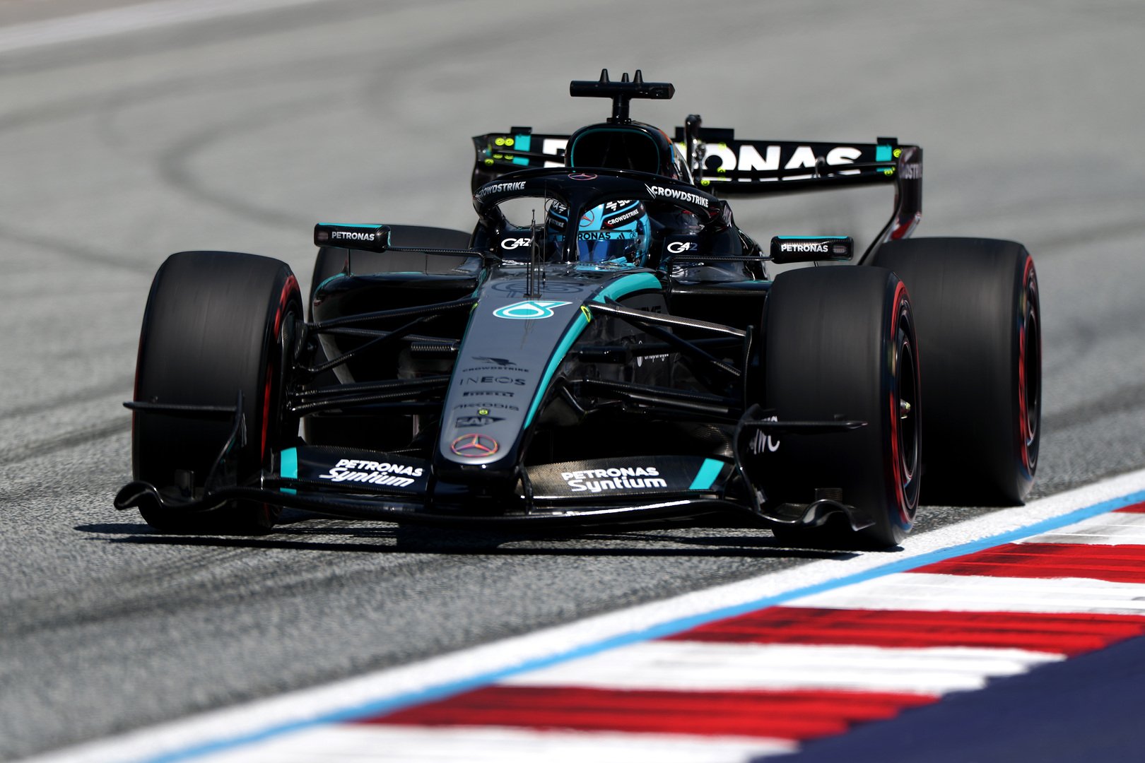 Mercedes pit crew performs tire change at the 2026 Austrian Grand Prix as Russell's Lap 40 strategy proves decisive