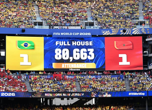 MetLife Stadium scoreboard showing official attendance of 80,663 for Brazil vs Morocco FIFA World Cup 2026 Group C match in East Rutherford New Jersey
